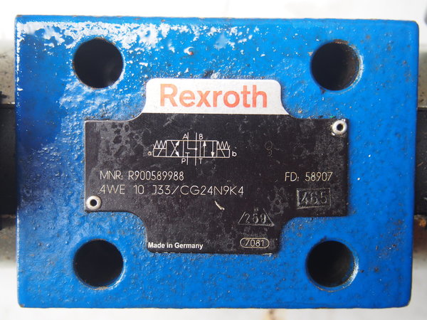 b) Distributeur  hydraulique REXROTH 4/3 MNR R900589988