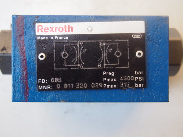 a) Limiteur de débit hydraulique REXROTH 0 811 320 029